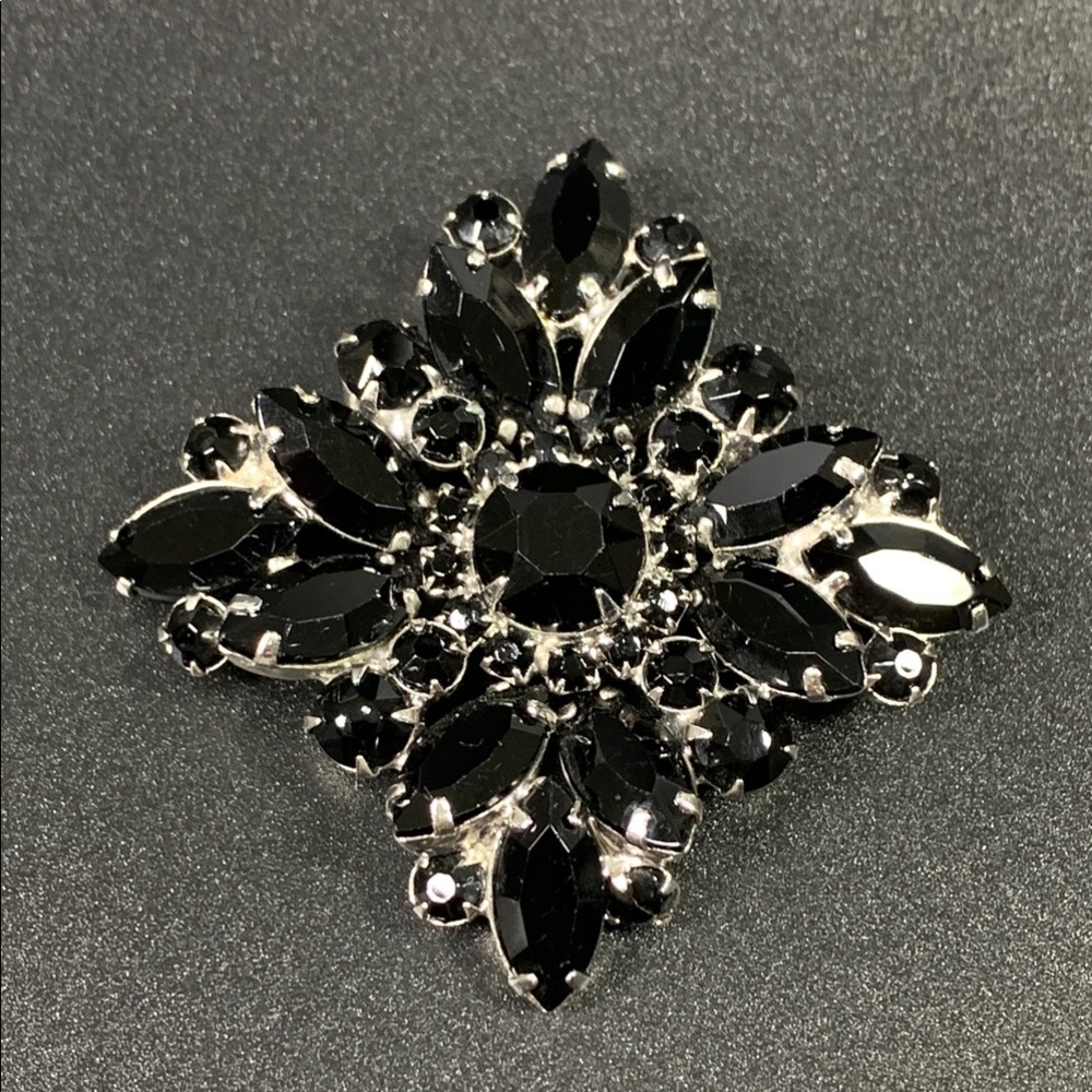Elegant Black and Silver Brooch